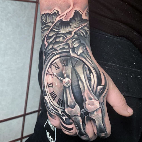 Skeleton Hand Tattoo Designs