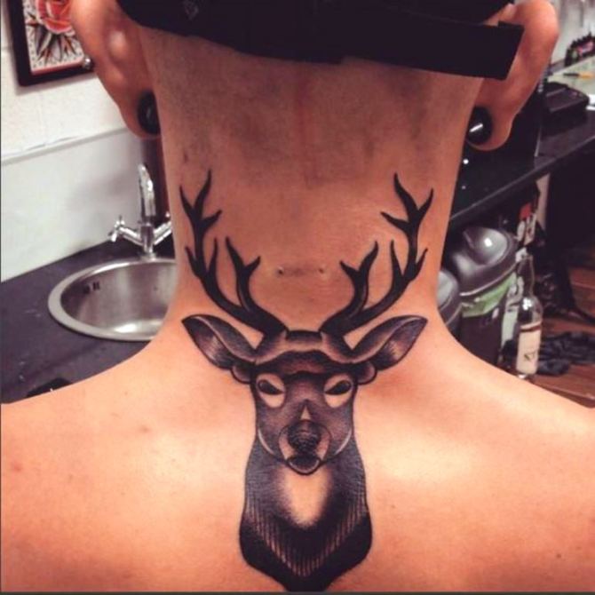 09 Deer Back Tribal Tattoo - 30 Deer Tattoos