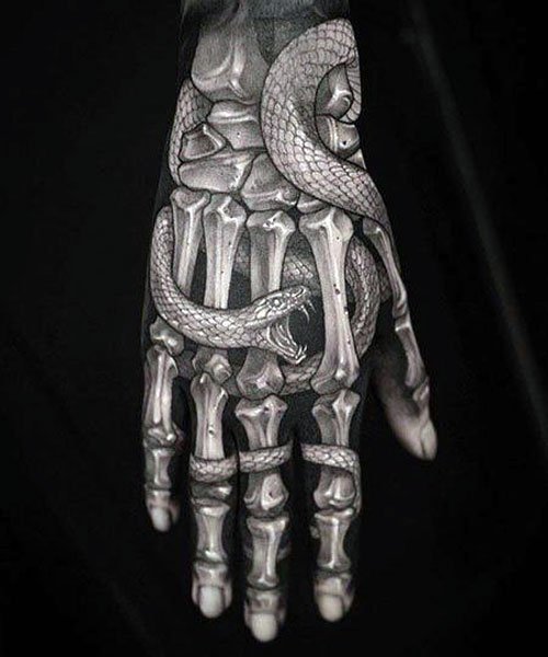 Snake Skeleton Hand Tattoo Designs