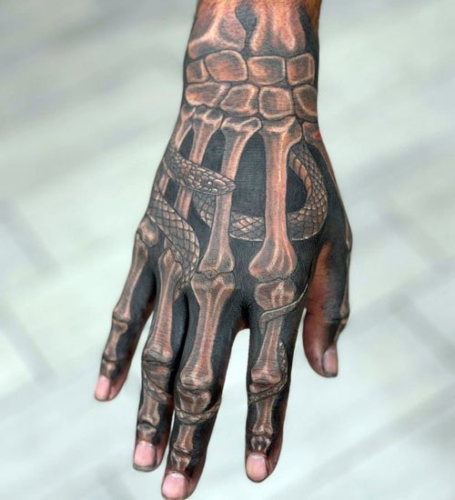 Snake Skeleton Hand Tattoo