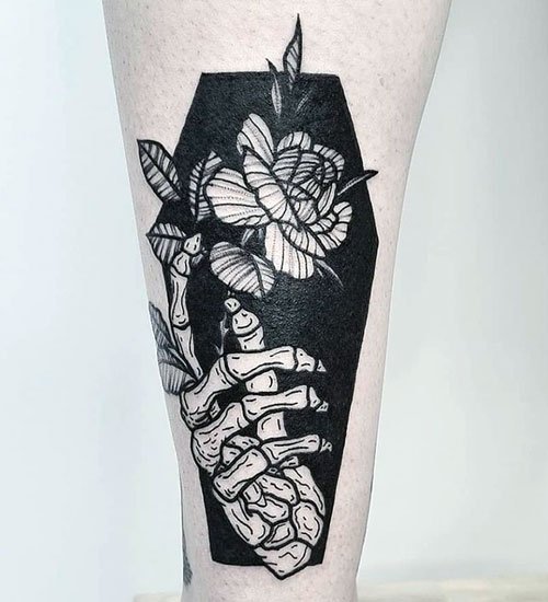 Hand Holding flower Tattoo