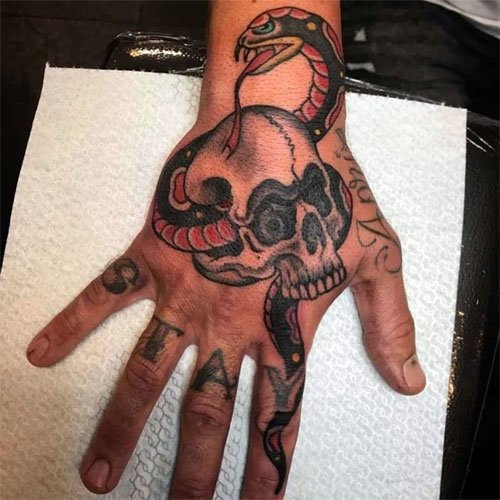 Snake Skeleton Hand Tattoo meaning
