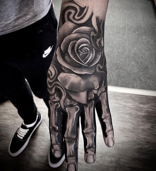 Rose Skeleton Hand Tattoo Meaning