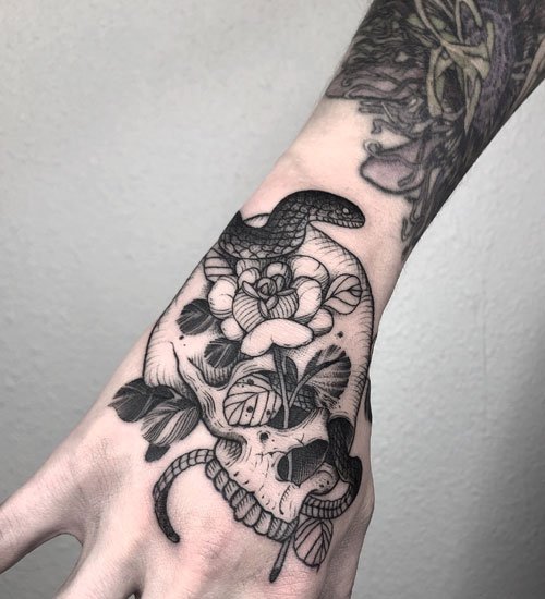 Snake and Flower skull tattoo 