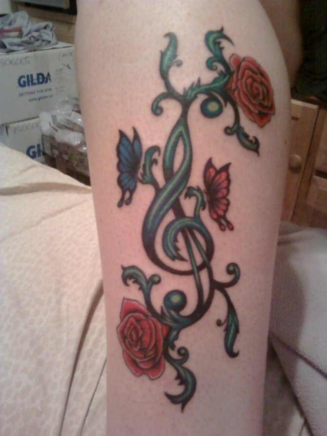 28-treble-clef-and-rose-tattoo