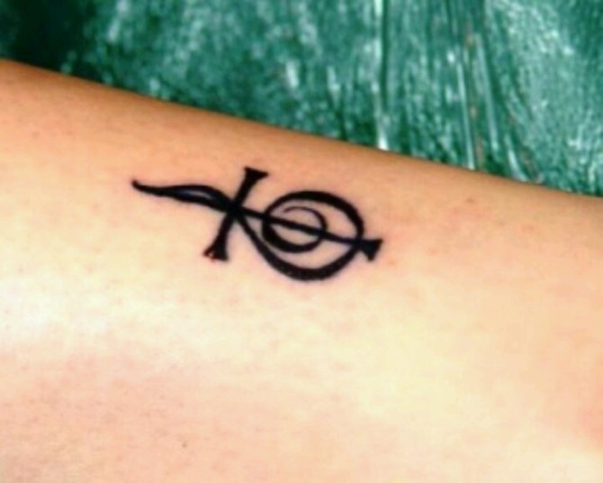 35-treble-clef-cross-tattoo