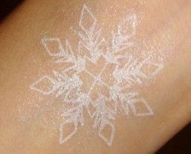 23 White Snowflake Tattoo - 30 White Tattoos