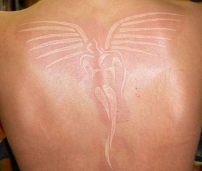 27 White Tattoo on Back - 30 White Tattoos