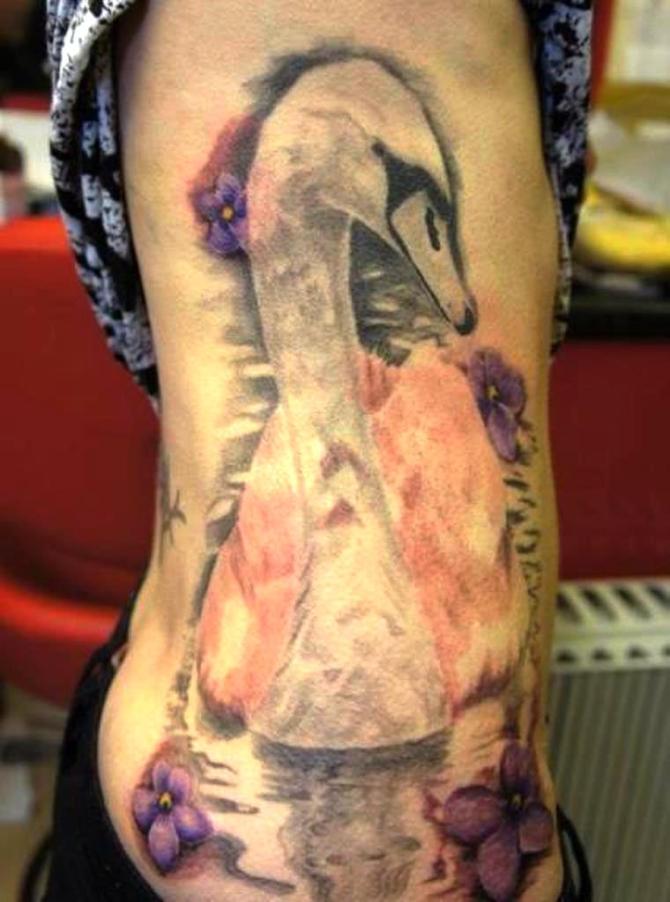 25 White Swan Tattoo on Ribs - 25 Swan Tattoos
