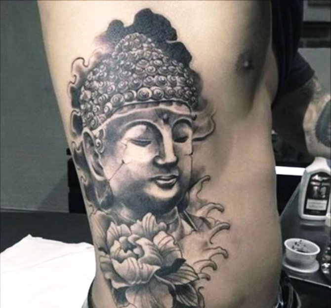 32 Buddhist Tattoo on Ribs