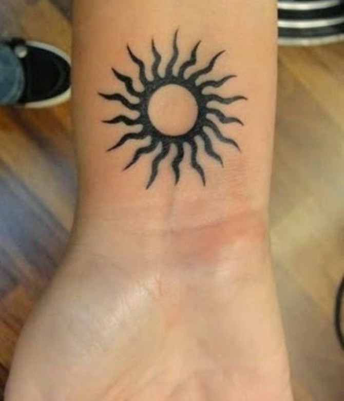 Sun Tattoo on Arm